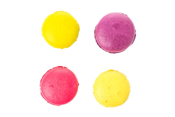 istock Sweet tasty macaroons isolated on a white background. Top view 969562750