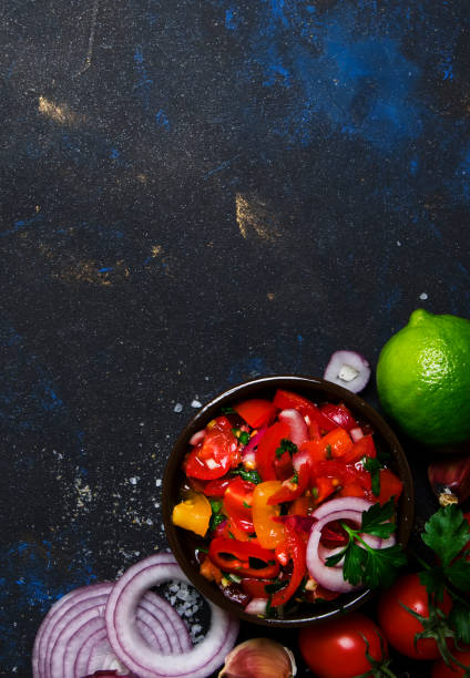 istock Tex-Mex Concept, Salsa Sauce, Tomatoes, Nachos and Lime 969563498