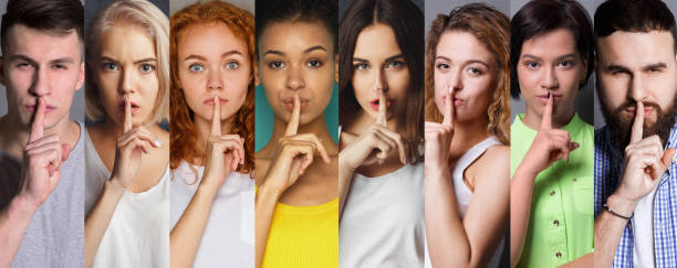 istock Collage of diverse people making hush sign at studio background 969563546
