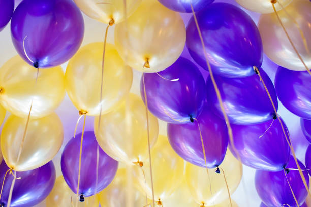 istock abstract background of helium balloons 969571196