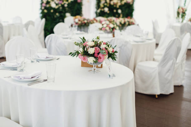 istock beautifully decorated table with flowers 969571692