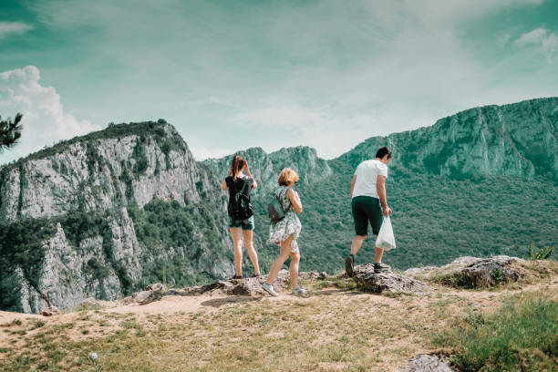 istock Three friends hiking in the nature 969571736