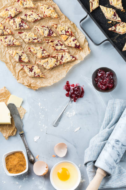 istock Homemade cake cookie bars with berry jam and ingredients 969572248