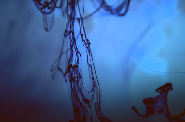 istock Ink in water. Underwater miracle. Ocean background. 969574812