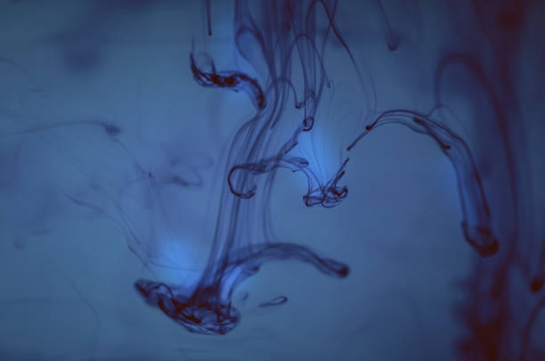 istock Ink in water. Underwater miracle. Ocean background. 969575056