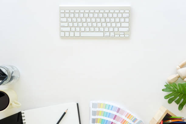 istock Top view artist workplace with computer and office supplies. 969578714