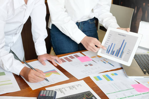 istock Business presentation with tablet computer finance data topic meeting. 969578910