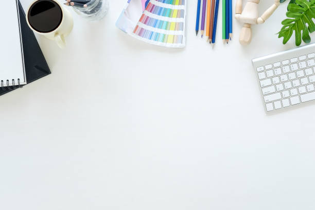 istock Top view artist workplace with computer and office supplies. 969579272