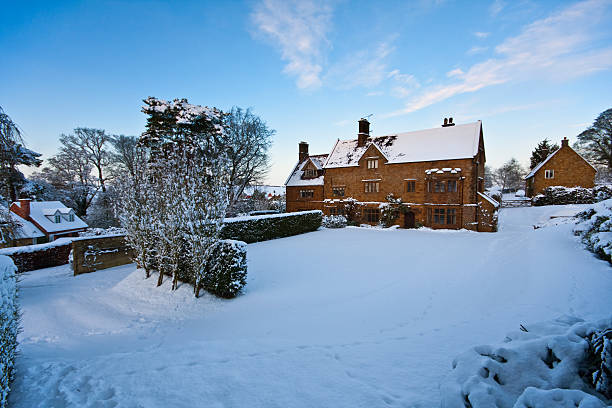 istock Grange house on a bright and snowy afternoon 96958076