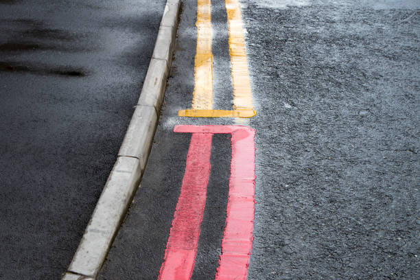 Double yellow and red lines No parking stock photo