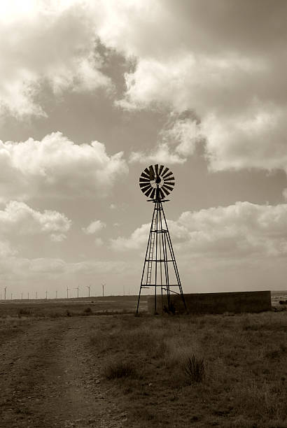 istock Old WINDMILL IN BLACK AND WHITE SKIES 96958332