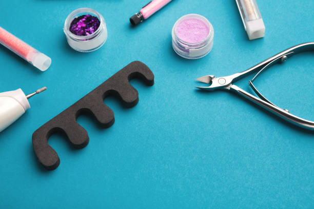 istock Manicure supplies on blue background 969586914