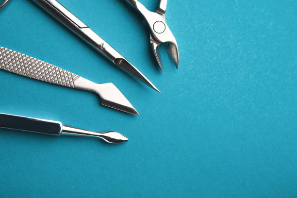 istock Manicure supplies on blue background 969586942