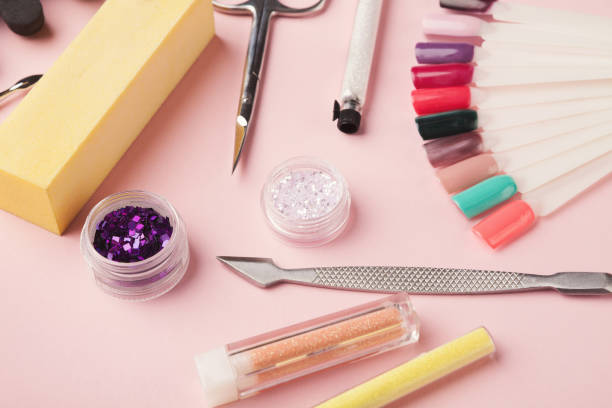 istock Manicure supplies on pink background 969586976