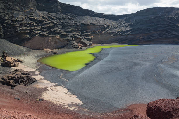 istock Famous Green Lagoon at inside a volcanic crater, Lanzarote 969587006