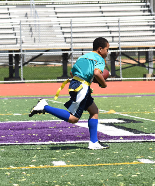 istock Flag Football Touchdown Run 969587274
