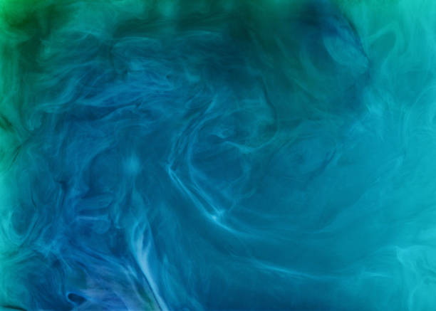 istock creative background with blue flowing and swirling paint 969588334