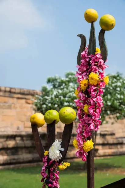 Hindu symbols, trishul normally found outside the temple, Gangaikonda Cholapuram, Tamil Nadu, India