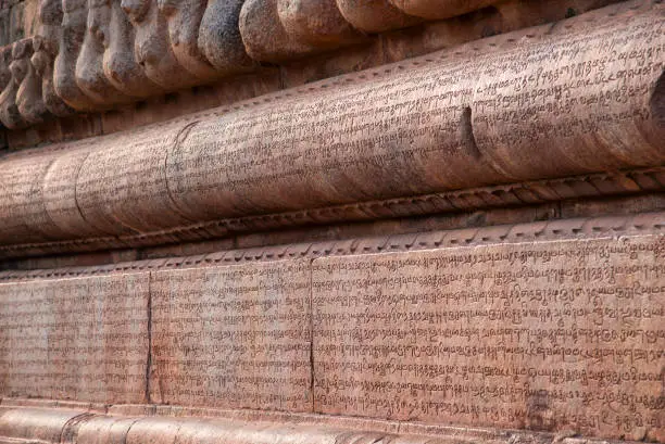 Carved inscriptions in Chola Grantha script and Tamil letters on the northern side of the Vimana. Brihadishvara temple, Thanjavur, Tamil Nadu, India
