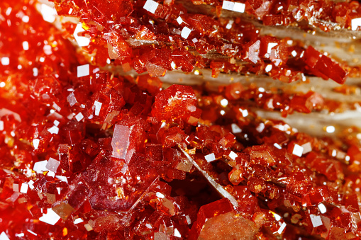 Macro shooting of natural gemstone. Texture of mineral vanadinite. Abstract background