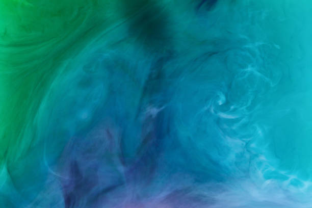 istock creative texture with blue and green flowing paint 969595838