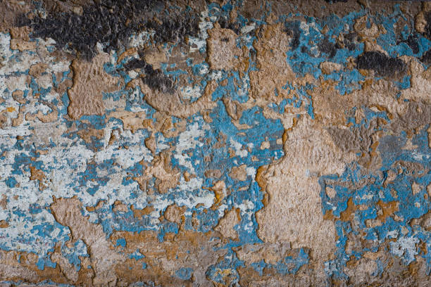 istock Cracked painted old wall detail, close-up textured background 969602602