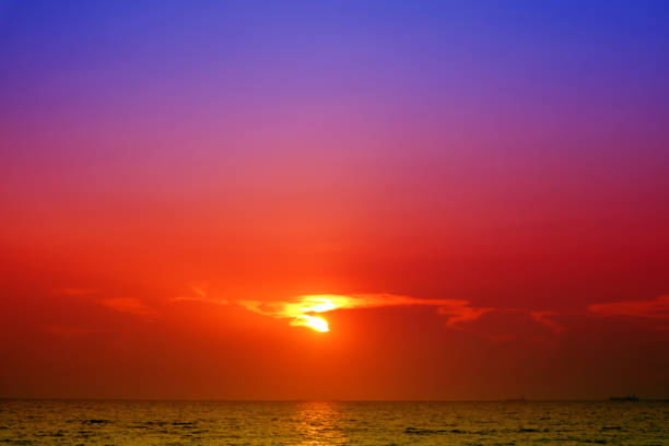 istock last light of sunset back silhouette cloud evening sky 969603364