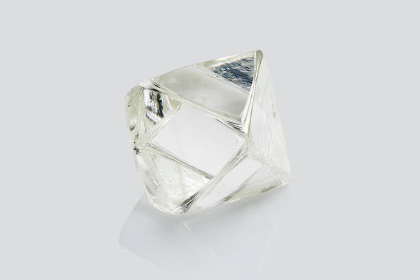 istock Transparent rough diamond isolated on white background 969606326
