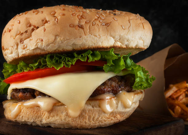 istock A delicious hamburger with a cutlet and cheese. 969612124