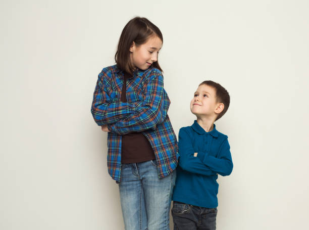 istock Happy brother and sister, studio background 969612782