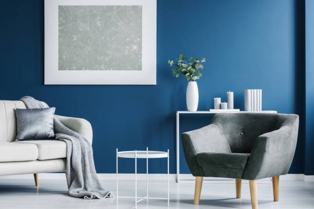 istock Coffee table, armchair and painting 969613480