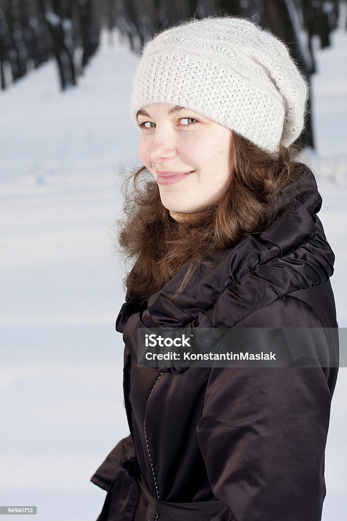 portrait of beautiful female Closeup portrait of beautiful young female in winter park. Looking at the camera. Outdoors portrait. Woman with confident smile. 20-24 Years Stock Photo