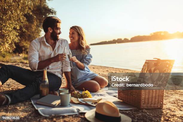 Celebrating Love Stock Photo - Download Image Now - Picnic, Couple - Relationship, Beach