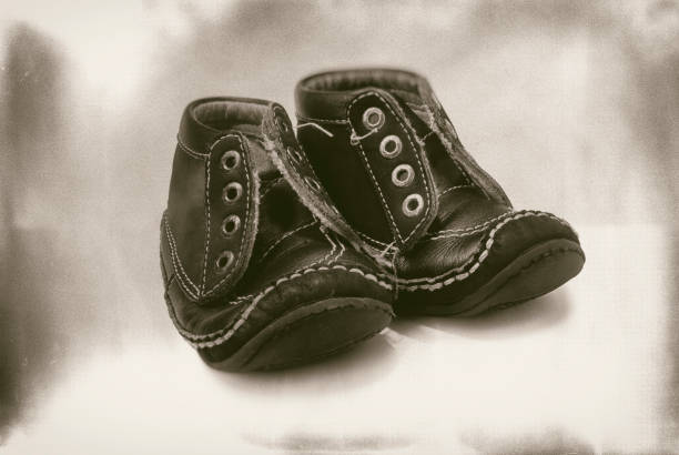 istock Kids shoes isolated on white background 969624340