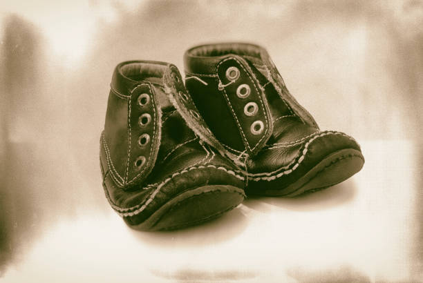 istock Kids shoes isolated on white background 969624368