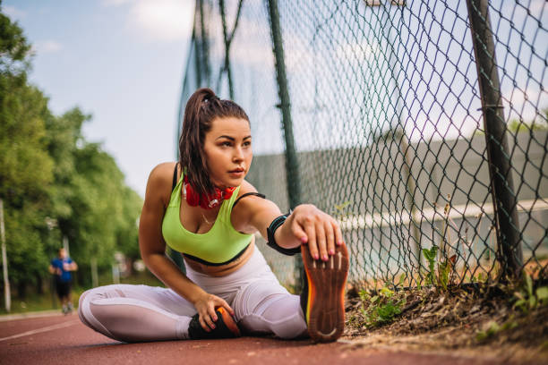 istock Young girl stretching after a hard workout 969625218