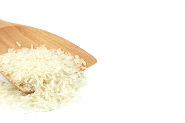 istock Jasmine rice on wooden ladle. 969628388