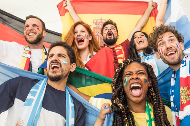 istock Soccer fans cheering for national teams 969628430