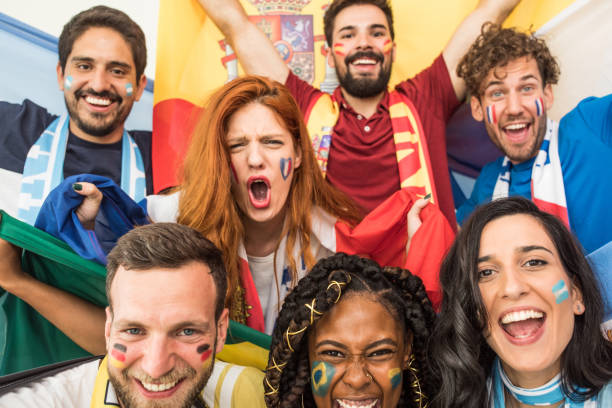 istock Soccer fans cheering for national teams 969628610