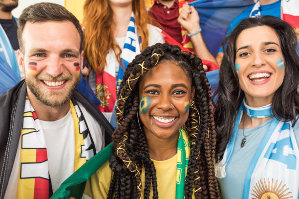 istock Soccer fans cheering for national teams 969629156