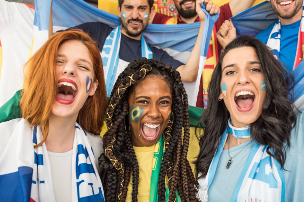 istock Soccer fans cheering for national teams 969629598