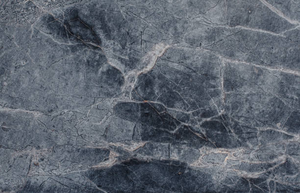 istock Fragment of stone texture with scratches and cracks. 969630646