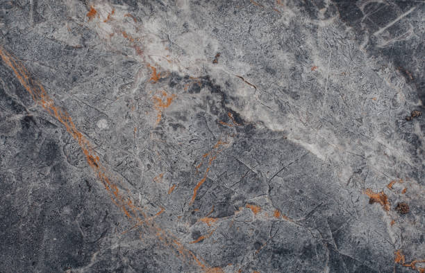istock Fragment of stone texture with scratches and cracks. 969632918