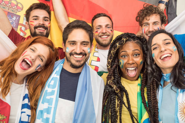 istock Soccer fans cheering for national teams 969635232