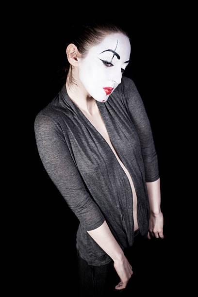 triste donna mime su sfondo nero - clown mime sadness depression foto e immagini stock