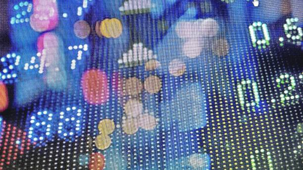 istock Low Angle View Of Illuminated Building Seen Through Glass 969653470