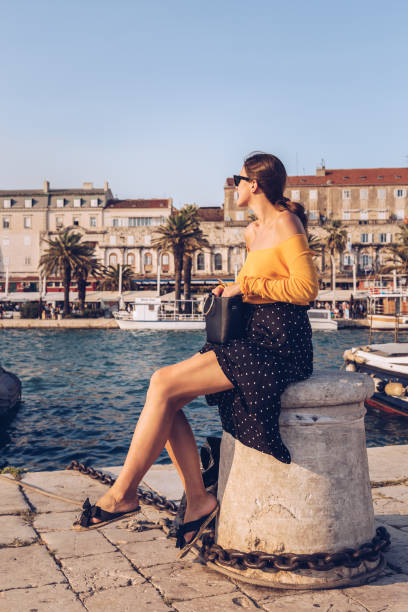 istock attractive woman posing outdoors on a summer day. 969655360