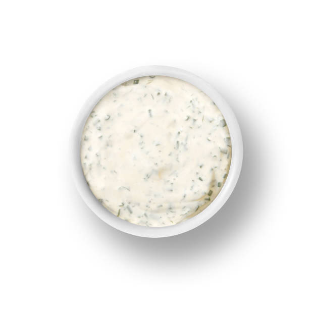 Ranch dressing in cup isolated on white dressing sauce condiment in small cup dish on white background ranch dressing stock pictures, royalty-free photos & images