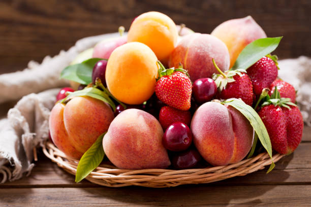 istock fresh fruits on wooden table 969659508
