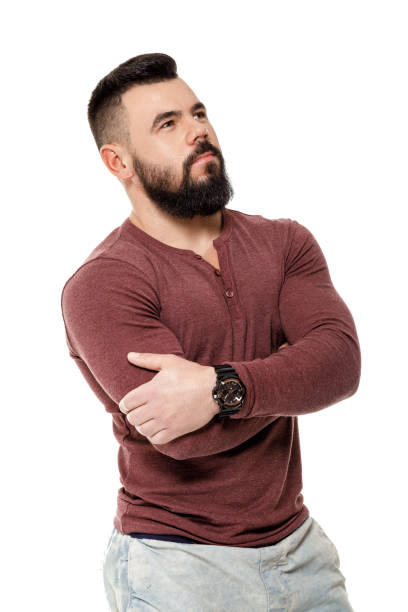 istock young serious bearded man isolated on white background 969666114